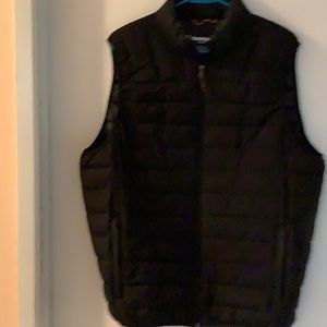 Hawke & Co quilted vest.  She’ll, lining and fill 100% polyester